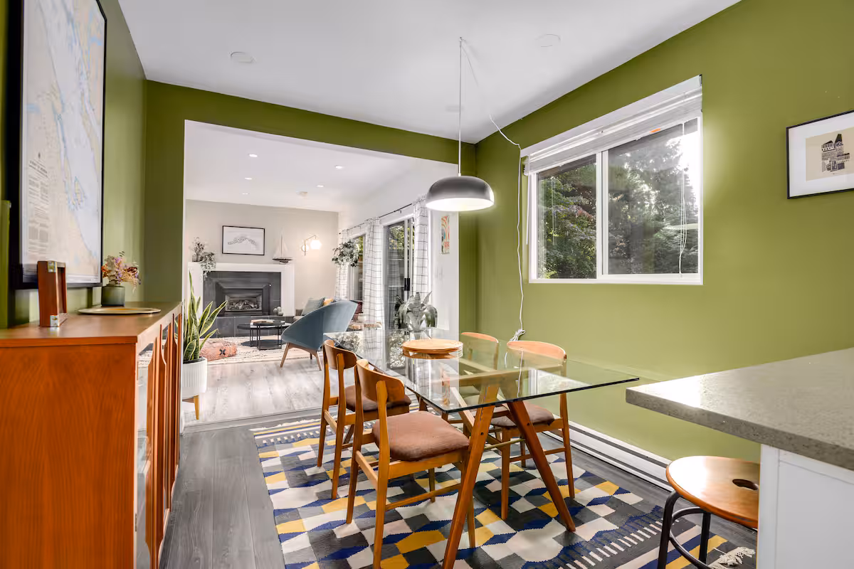 The dining room and kitchen of the suite